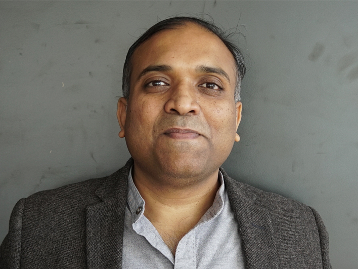 Headshot: Praveen Karadiguddi.